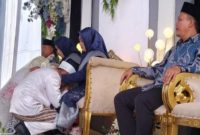 Rika Amiyana dan Suami usai akad nikah (Dok. Ist)