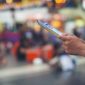 Women enjoy traveling on the map to the train station. Holiday travel ideas.