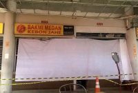 Pasar modern Cisauk yang dipasangi garis polisi (Dok. Ist)