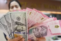 Rupiah Tembus Rp18.000